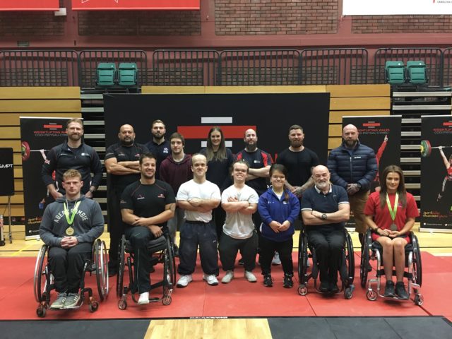 Para Powerlifters with their medals and coaches